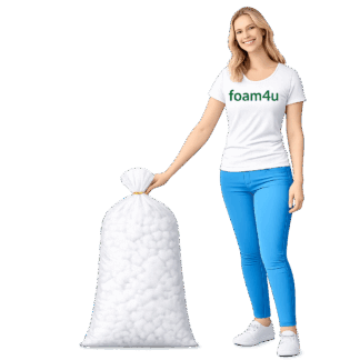 Transparent bag of white hollow fibre cushion filling held by model wearing Foam4u T-shirt on transparent background